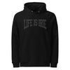 Black knit pullover unisex hoodie featuring on front "life is irie" black text graphic.