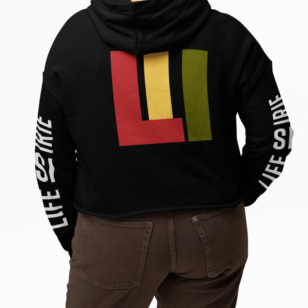 Gender Neutral Crop pullover hoodie featuring the 'life is irie' icon in red, gold, green on the back. On both sleeves "life is irie" text. Matching flat drawstrings.