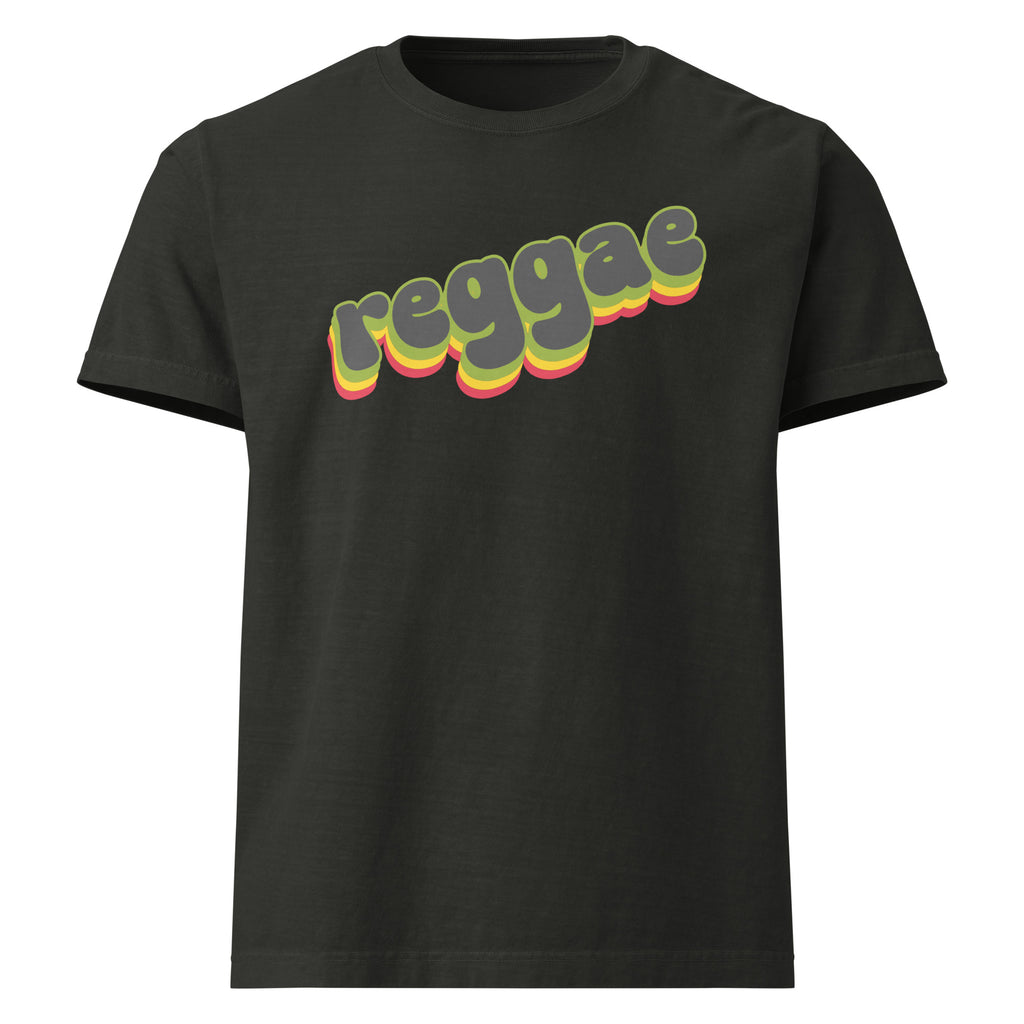Product mock-up of a black short-sleeve T-shirt with the word 'reggae' printed across the chest in a retro 3D-style font with yellow, green, and red shadowing