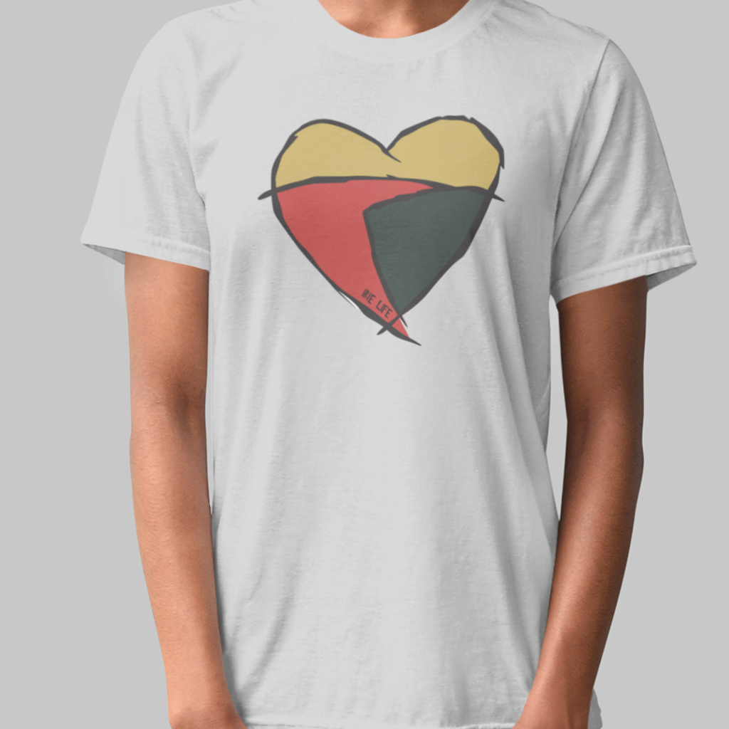 White knit t-shirt featuring front 'heart' graphic in red, yellow, green.  Gender neutral.