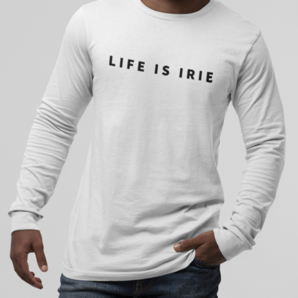 White gender neutral knit long-sleeve t-shirt featuring front "LIFE IS IRIE" text graphic in black.   