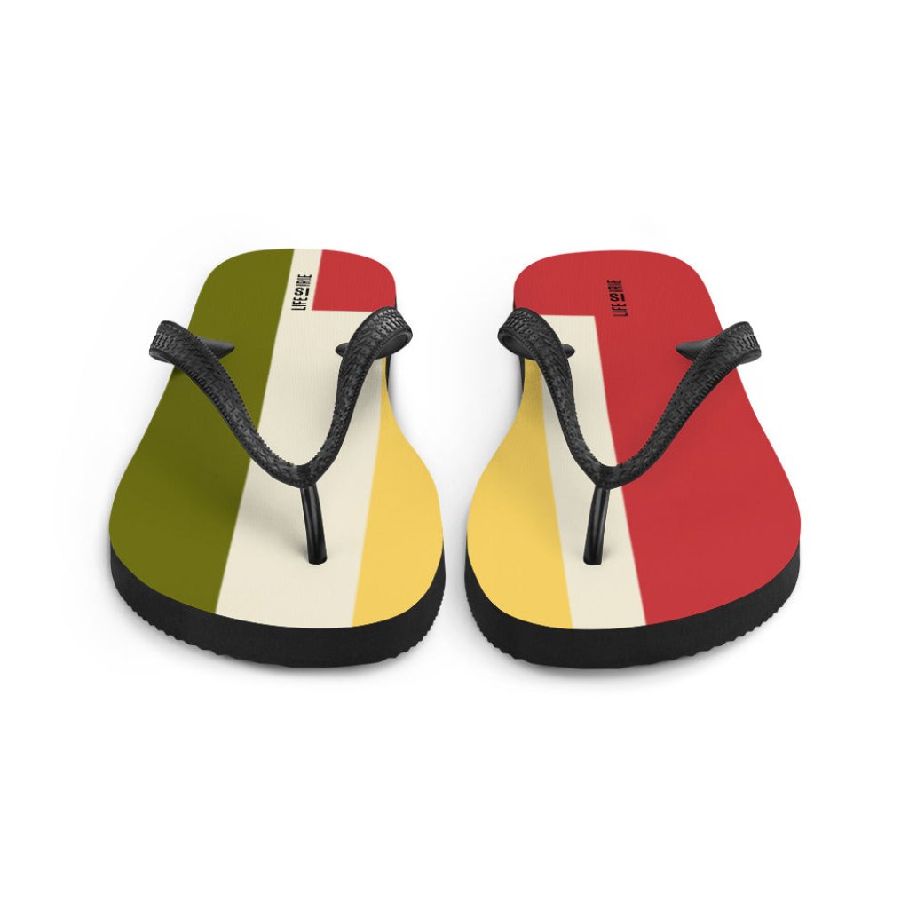 LIFE IS IRIE flip-flop. Rubber sole. 100% polyester fabric lining for comfort.  Red Gold and Green