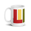 white coffee and tea mug featuring LIFE IS IRIE icon graphic in red, gold, green.