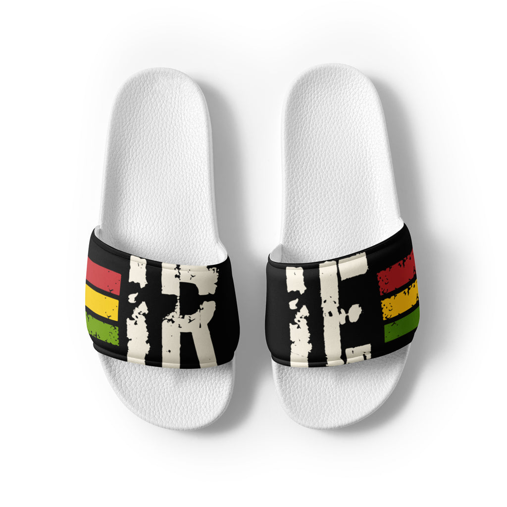 Women's slides, black and white cushioned upper strap featuring "irie" text with Reggae stripes.